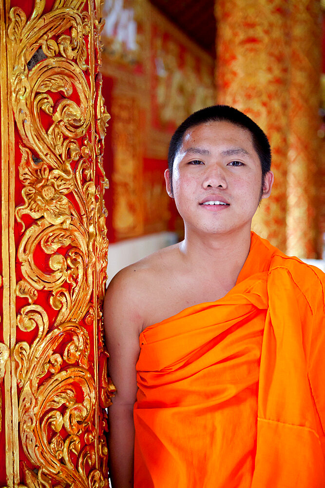 Young Buddhist monk in the Wat Phra That Lampang Luang Buddhist temple, Lampang, Northern Thailand, Thailand, Southeast Asia, Asia