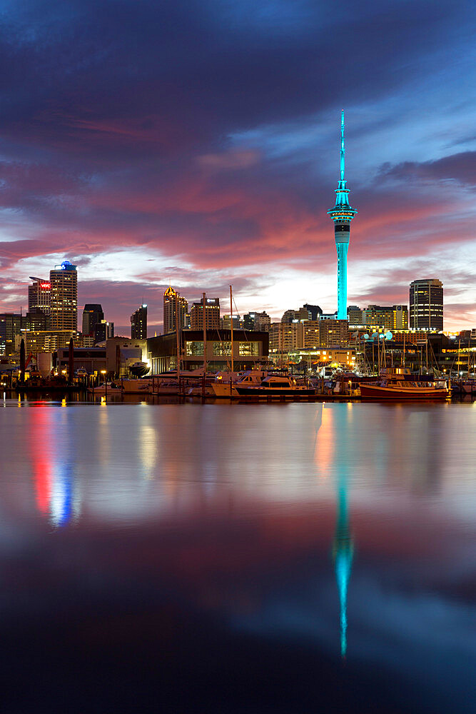 Sky Tower and city at dawn from Westhaven Marina, Auckland, North Island, New Zealand, Pacific