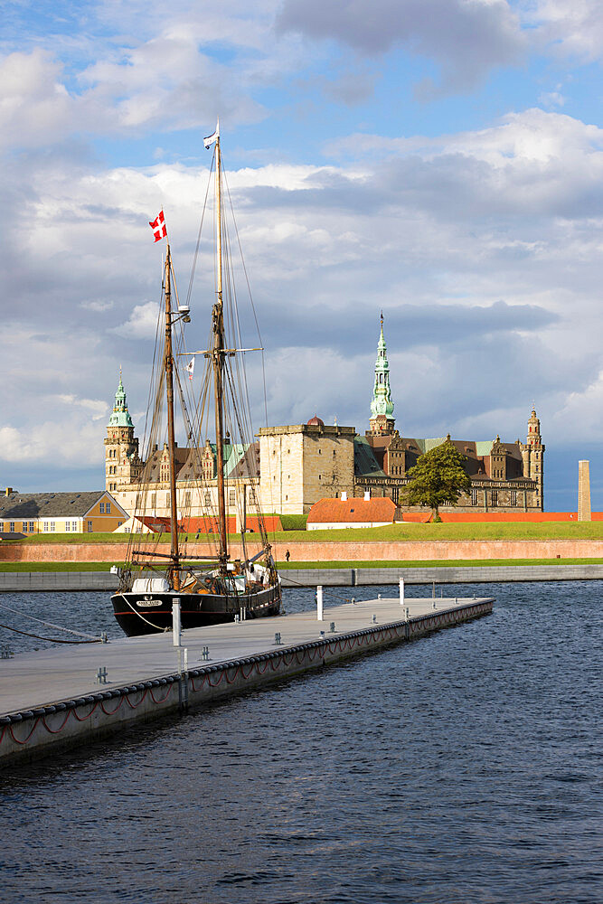 Tall ship in harbour with Kronborg Castle used as setting for Shakespeare's Hamlet, Helsingor, Zealand, Denmark, Scandinavia, Europe