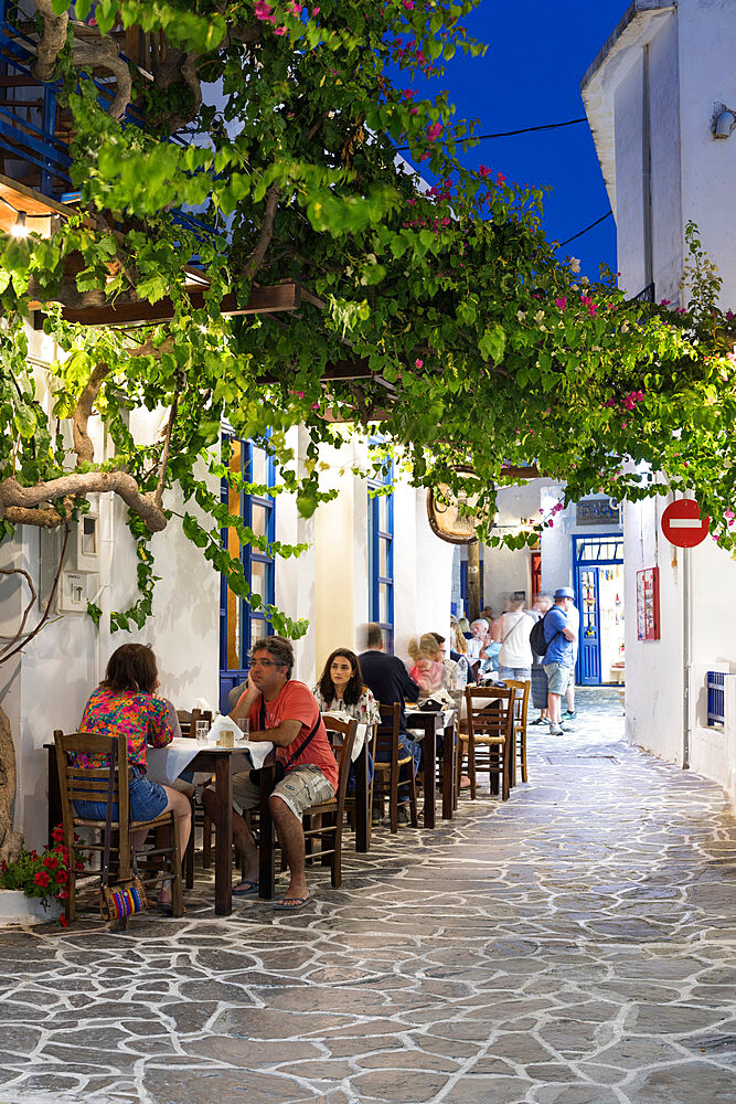 Outdoor restaurant in the old town of Plaka at night, Plaka, Milos, Cyclades, Aegean Sea, Greek Islands, Greece, Europe