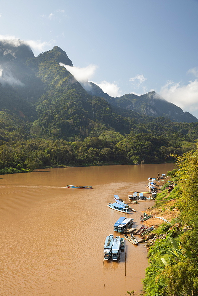 Nam Ou River with karst peaks and lifting mist, Nong Khiaw, Luang Prabang Province, Northern Laos, Laos, Indochina, Southeast Asia, Asia