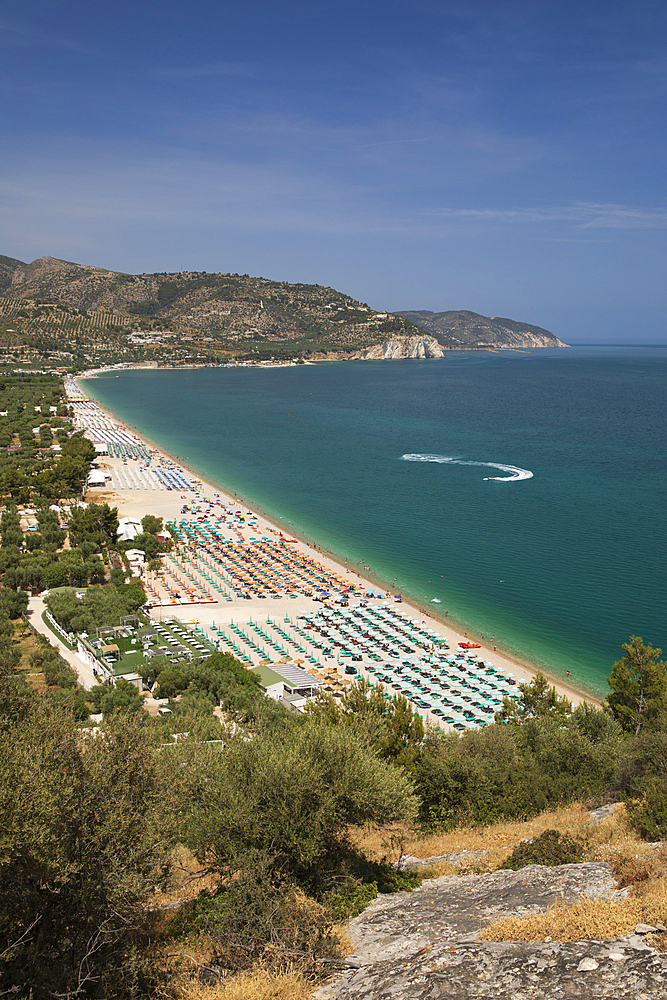 View looking north over the beach resort of Mattina with Gargano promontory in distance, Mattinata, Foggia Province, Puglia, Italy, Europe