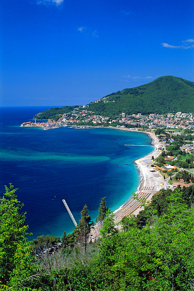 View over town and Slovenska Beach, Budva, The Budva Riviera, Montenegro, Europe