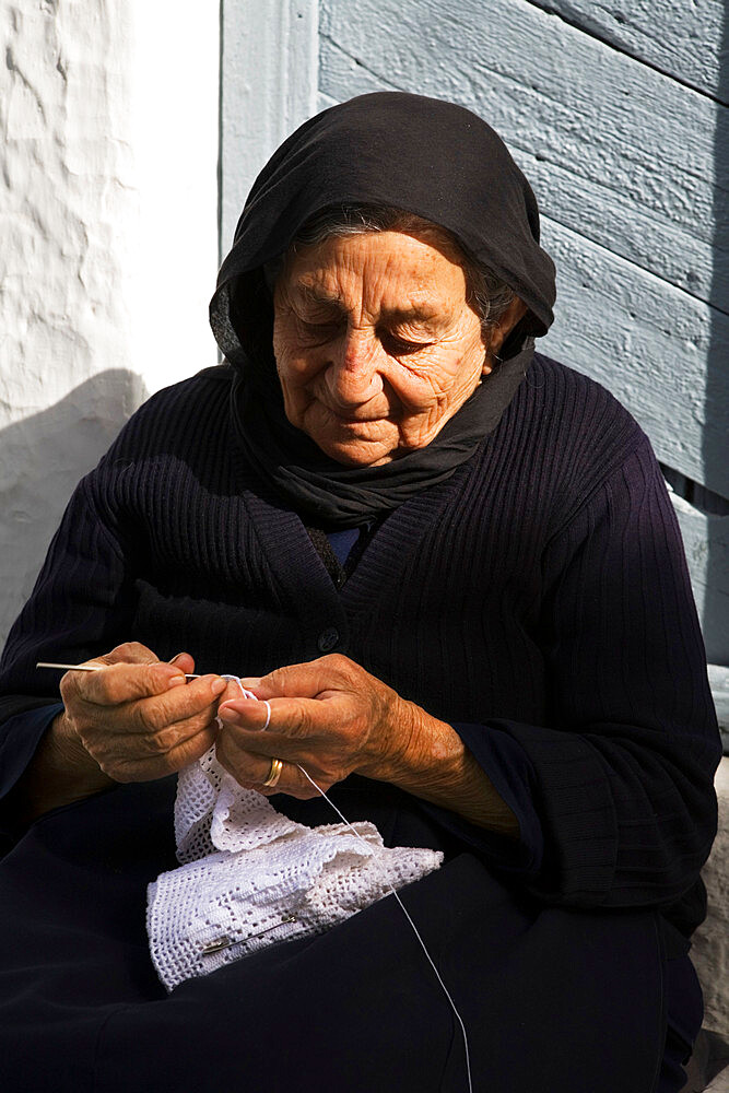 Old woman making traditional crochet textiles, Kritsa, Lasithi region, Crete, Greek Islands, Greece, Europe