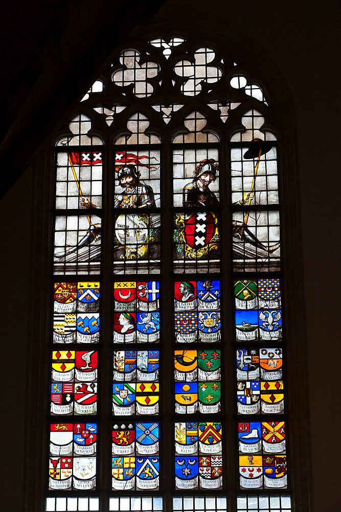 Oude Kerk (Old Church) stained glass windows showing Coats of Arms, Amsterdam, North Holland, Netherlands, Europe