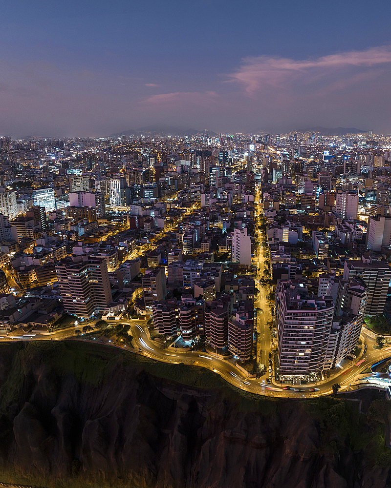 Aerial view over Miraflores at dusk, Lima, Peru, South America