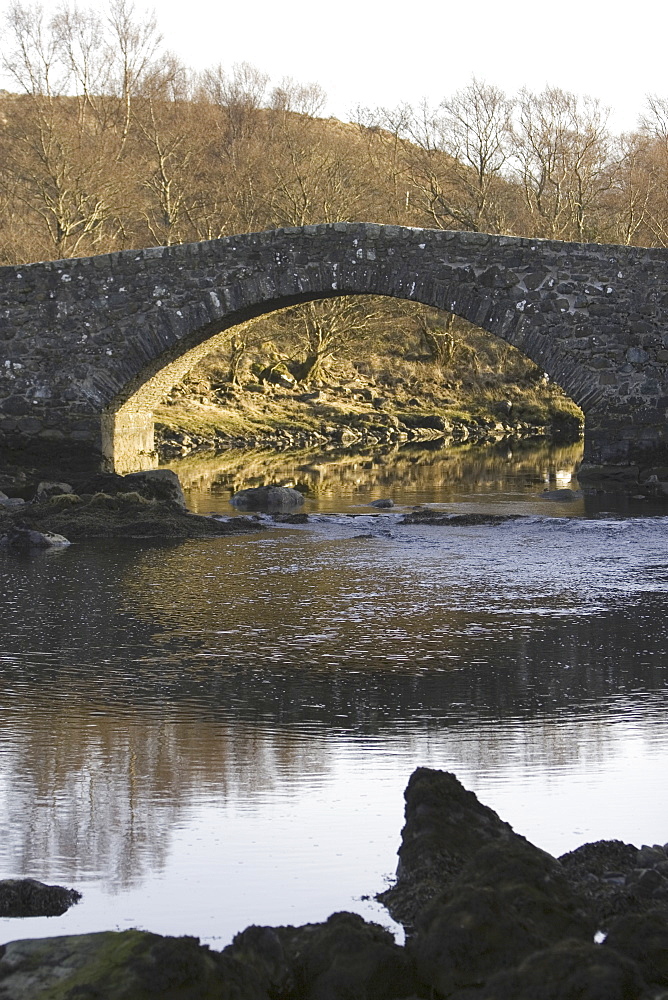 Bridge over tidal river at head of sea loch, Loch Don.  Hebrides, Scotland