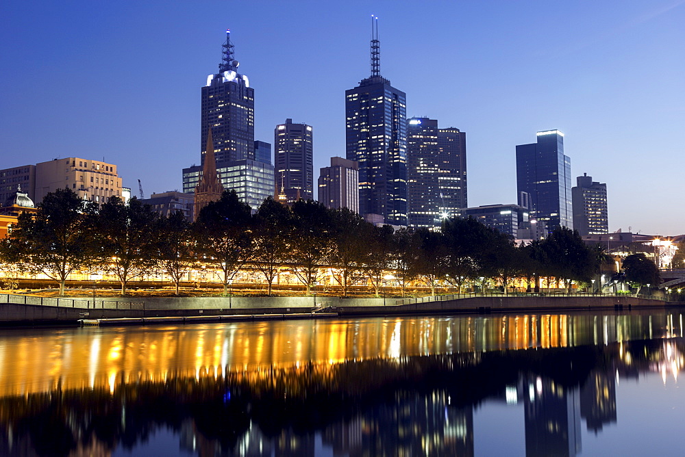 Cityscape with reflection in Yarra river, Melbourne, Victoria, Australia