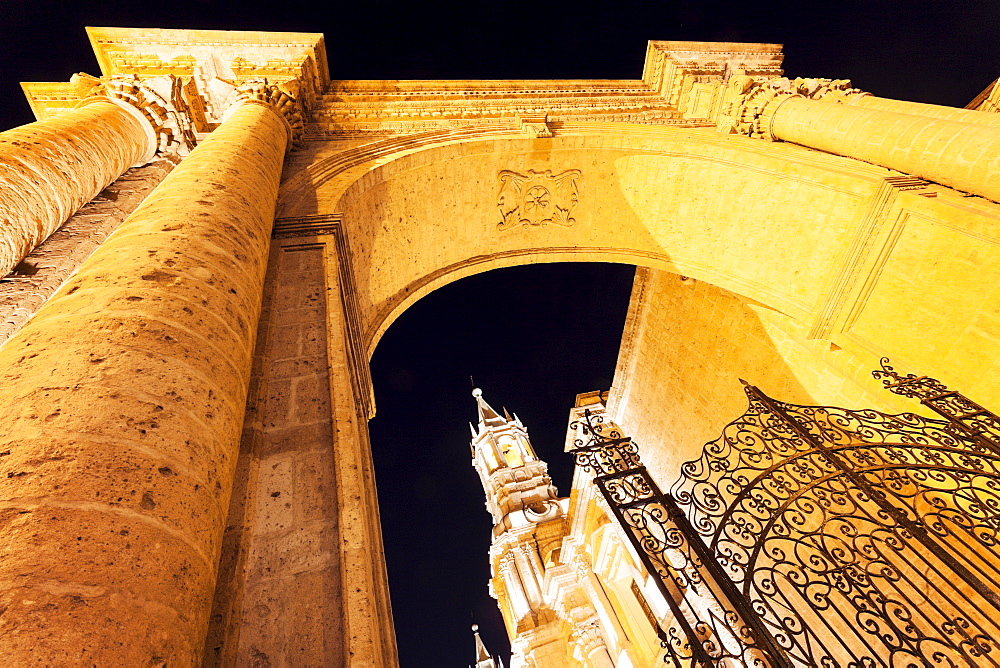 Cathedral on Plaza de Armas seen from triumphal arch, Arequipa, Peru