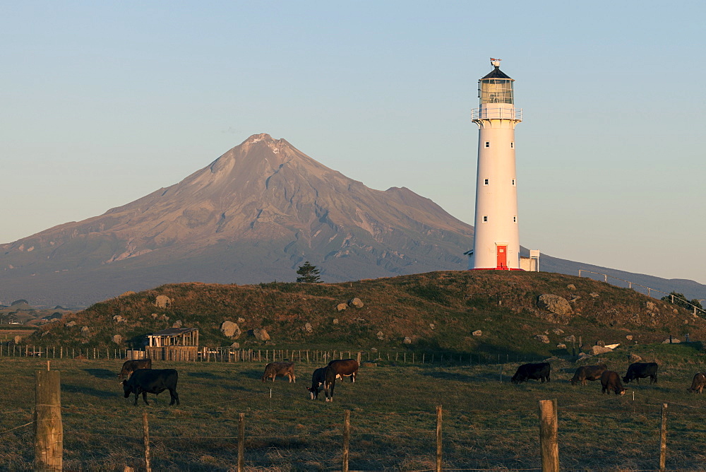 Mount Taranaki and lighthouse at sunset, New Zealand