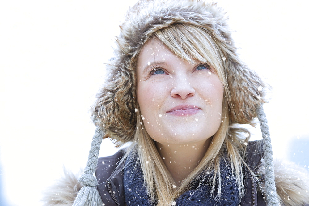 Portrait of woman wearing knit hat smiling