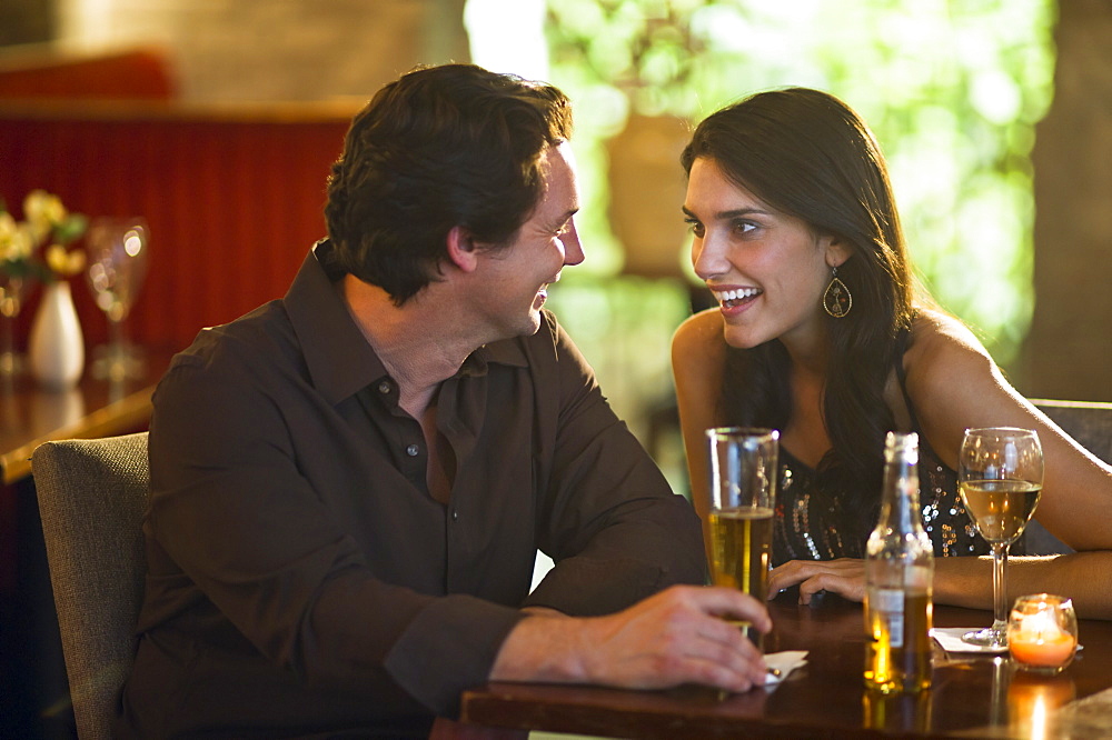 Couple drinking in restaurant