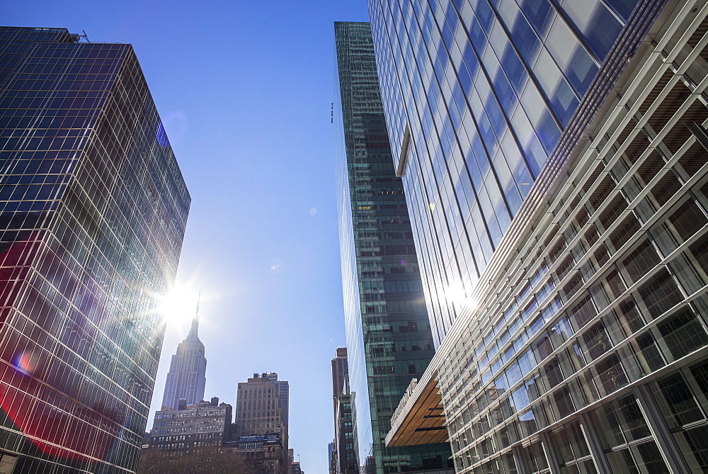 Skyscrapers with solar flare, New York City, USA
