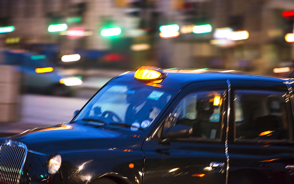 UK, London, Black cab at night, UK, London