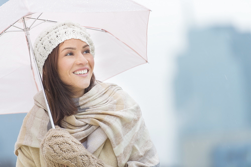 Portrait of woman with umbrella