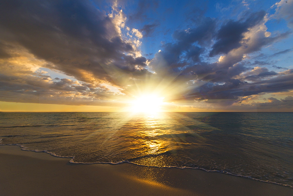 Sun setting over sea, Jamaica