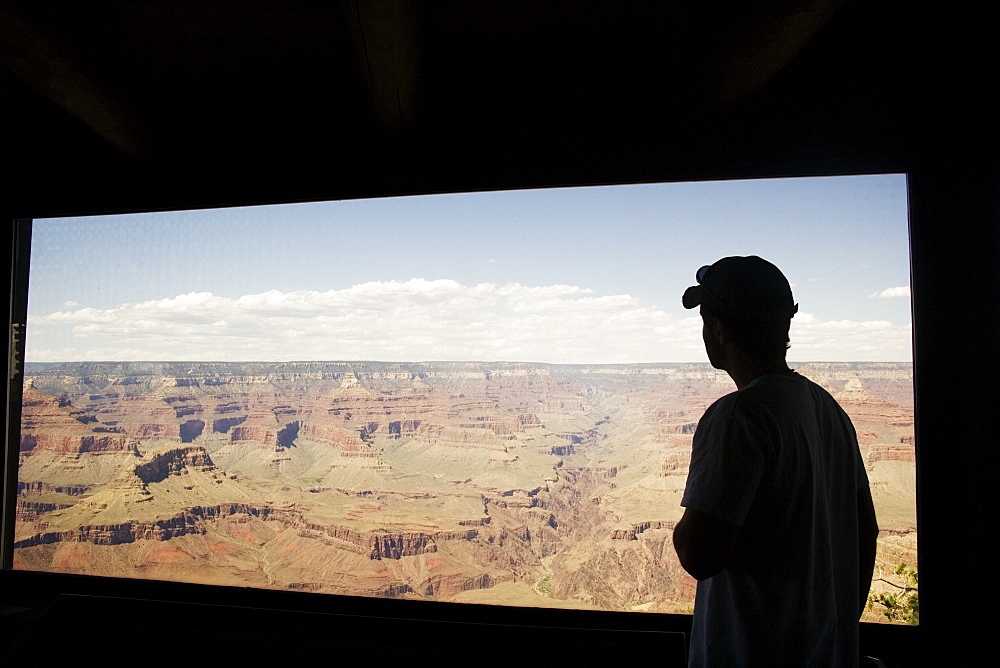 Silhouette of man on boxcar