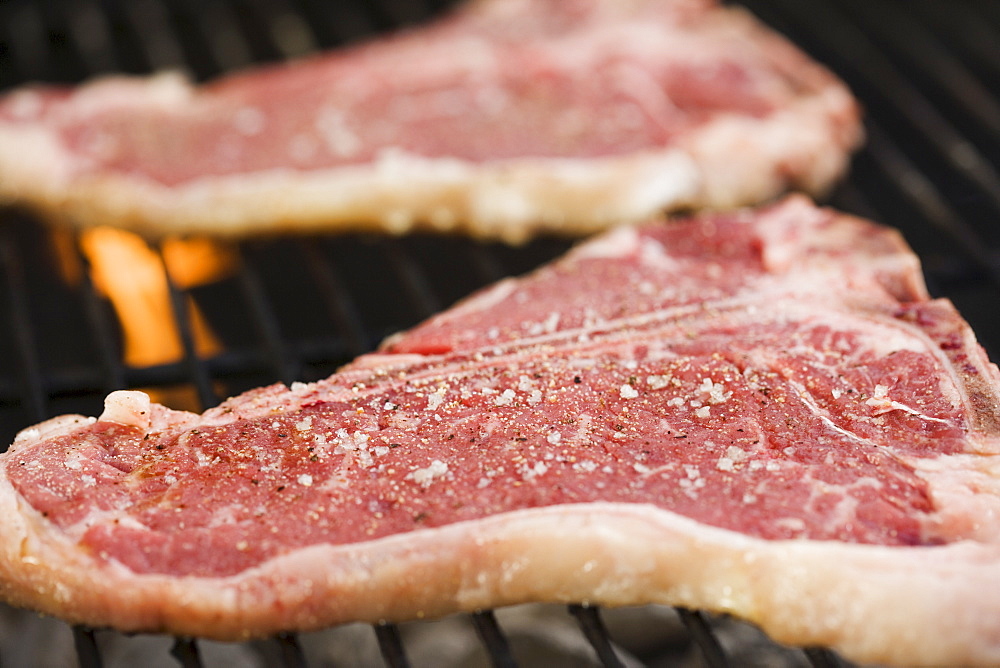 Grilling steaks outdoors