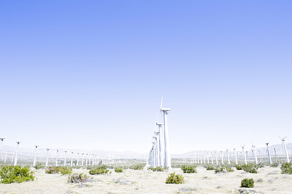 USA, California, Palm Springs, Coachella Valley, San Gorgonio Pass, Wind turbines against blue sky