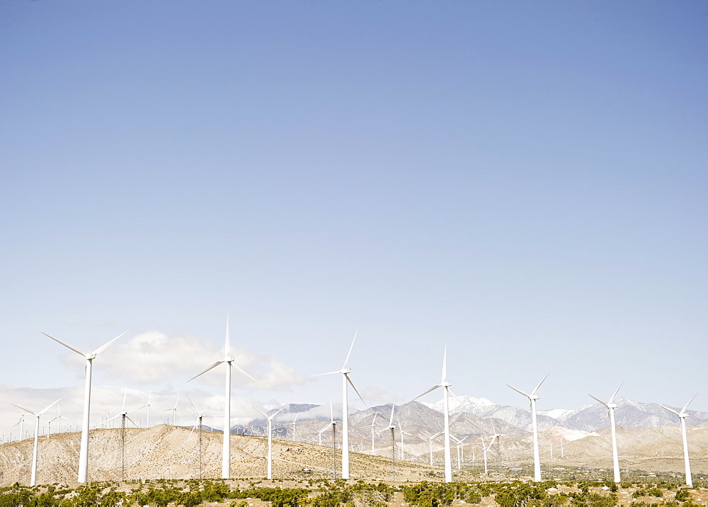 USA, California, Palm Springs, Coachella Valley, San Gorgonio Pass, Wind turbines with mountains in background