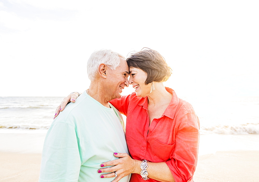 Older couple spending time together on beach, Jupiter, Florida