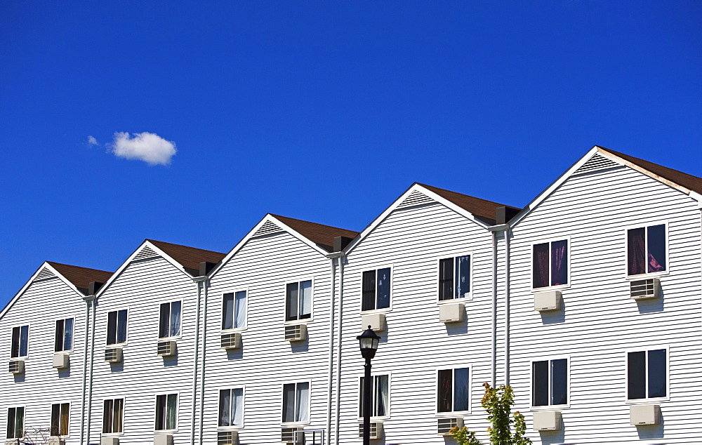 Row houses under blue sky