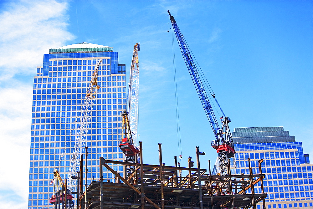 Urban construction site with cranes