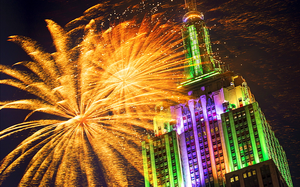 Empire state building with firework display, New York City, New York