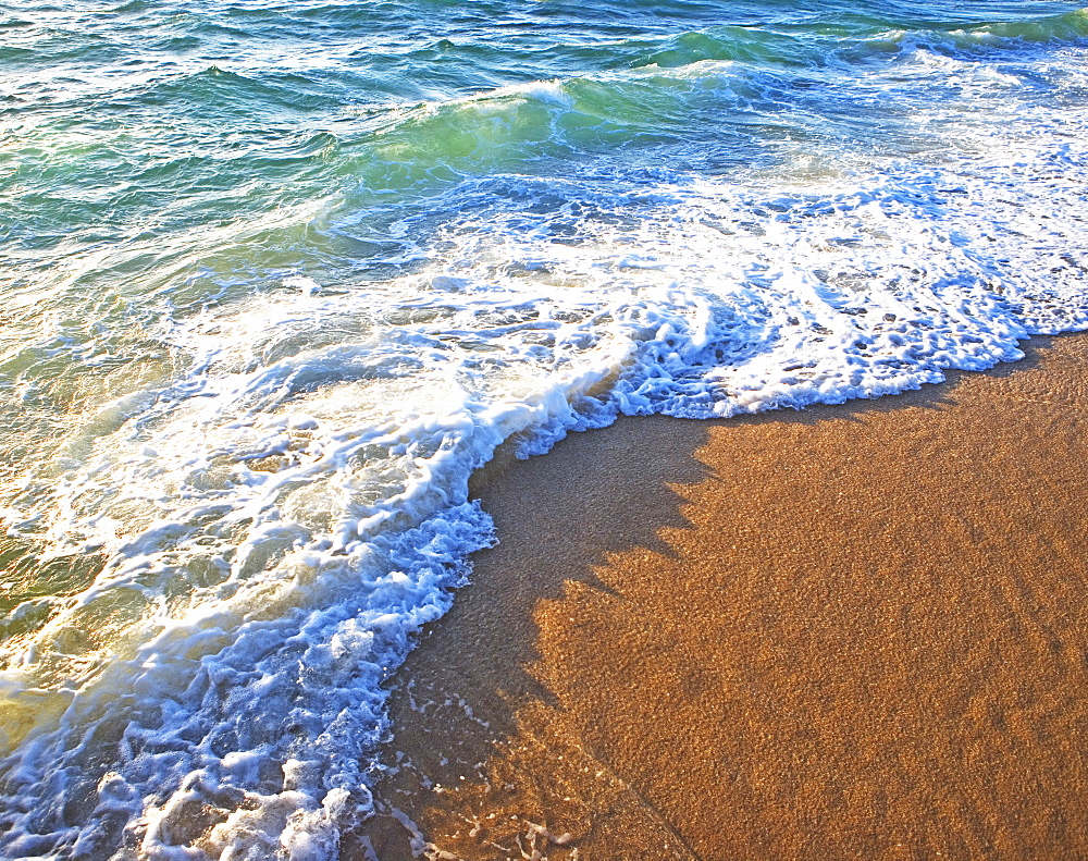 High angle view of ocean waves on shore