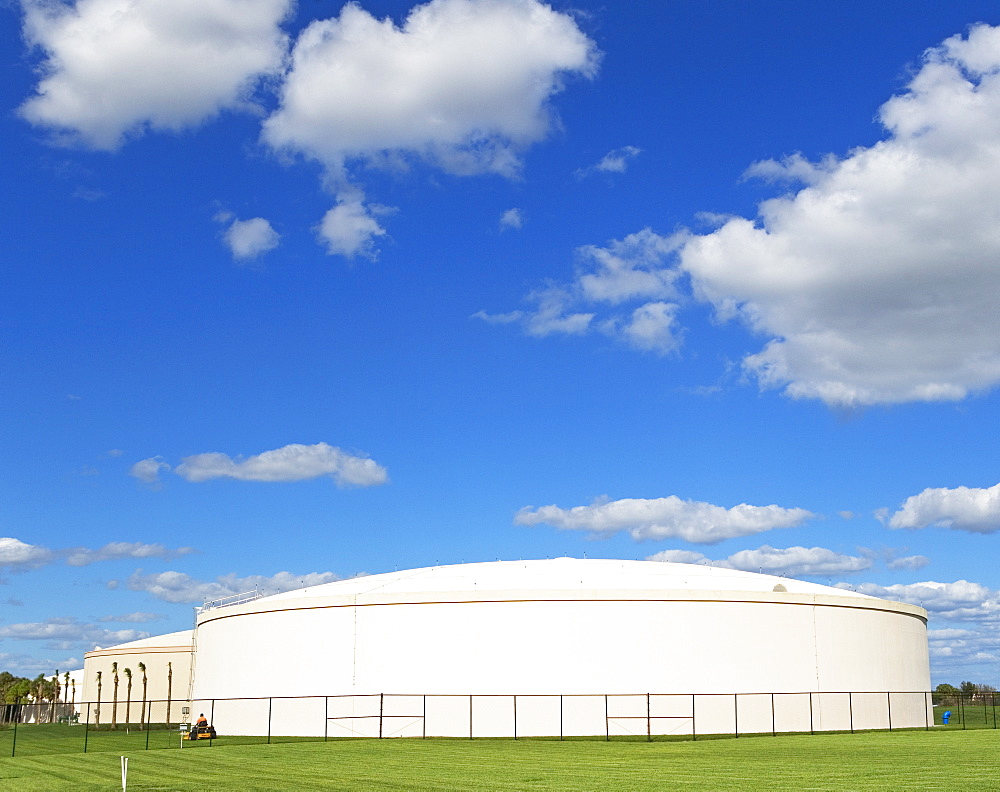 Oil refinery storage under blue sky