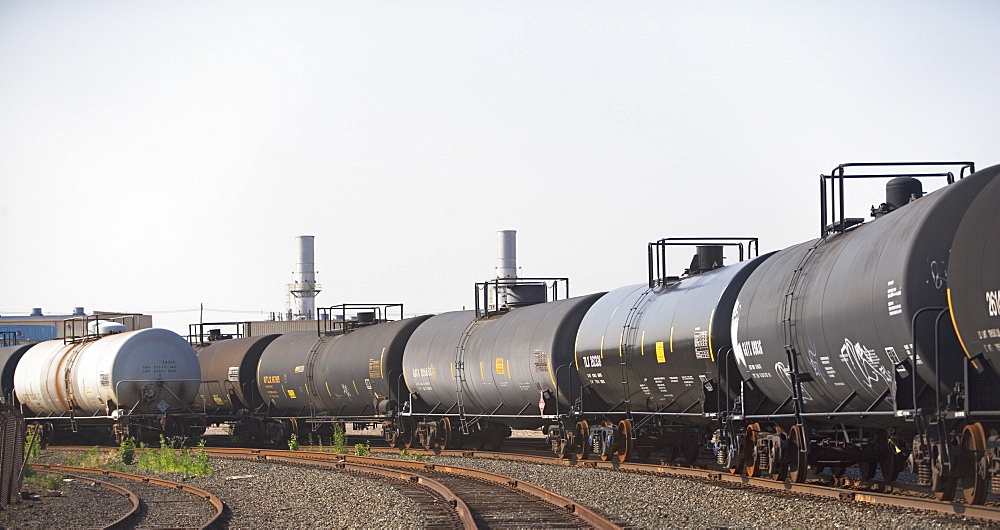 Row of oil tankers in train track