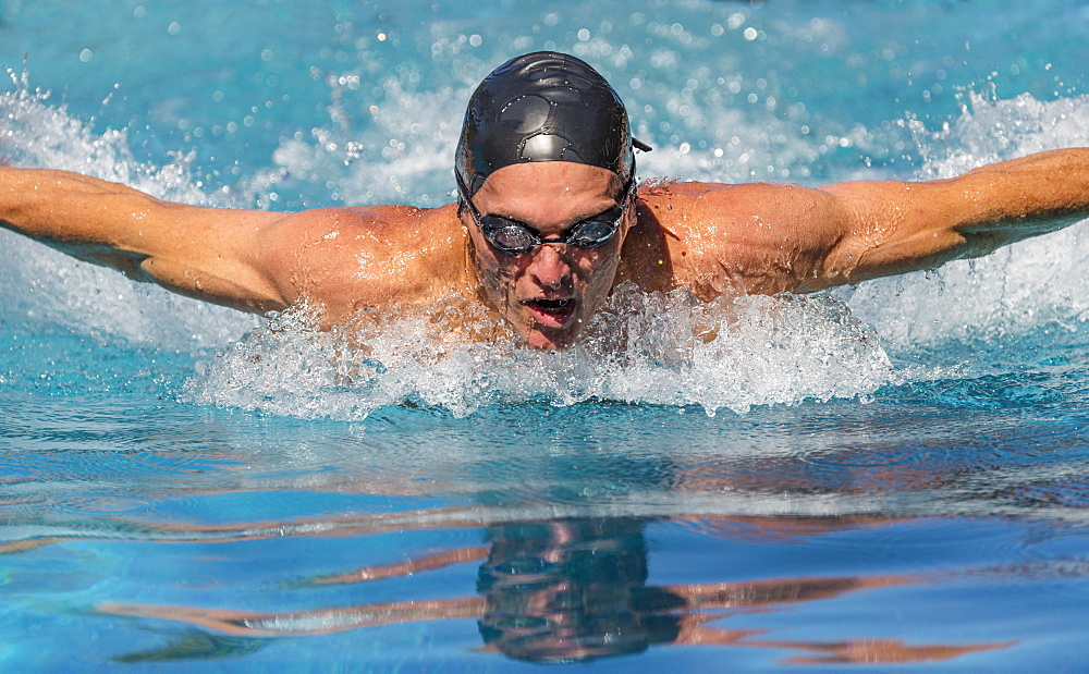 Athletic man swimming