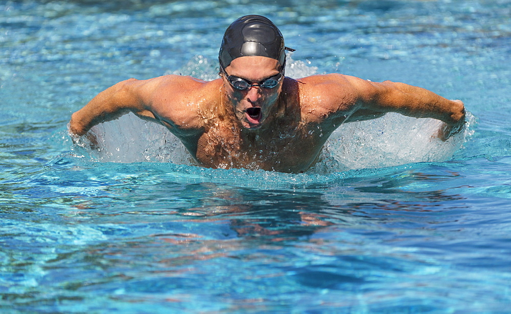 Athletic man swimming