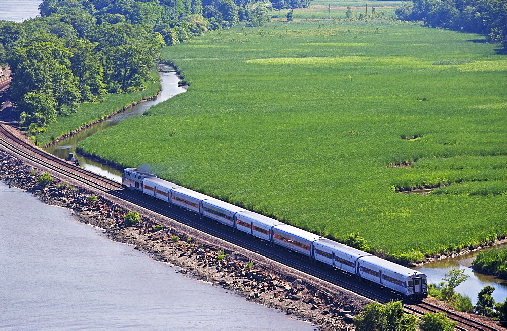 Train beside Hudson River