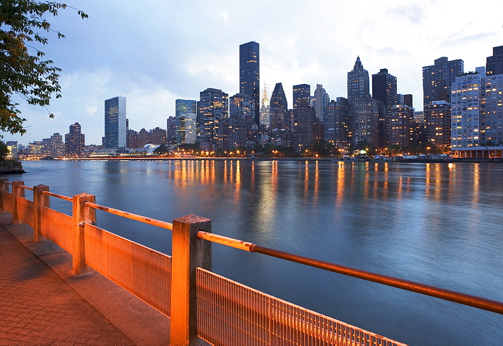 USA, New York State, New York City, Skyline with United Nations Buildings and United Nations Plaza at sunset