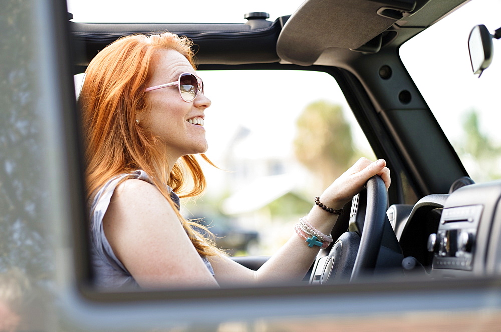 Woman sitting in car