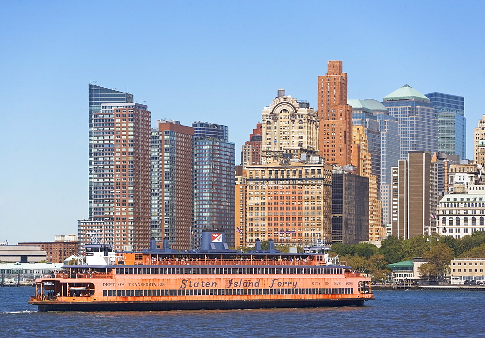 USA, New York City, Manhattan, Battery Park skyline with ferry