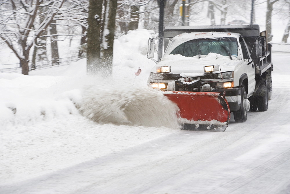 USA, New York City, snowplowing truck