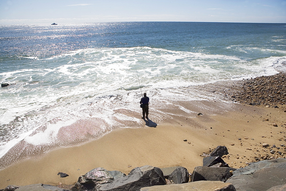 USA, New York, Long Island, Montaurk, Man fishing in sea