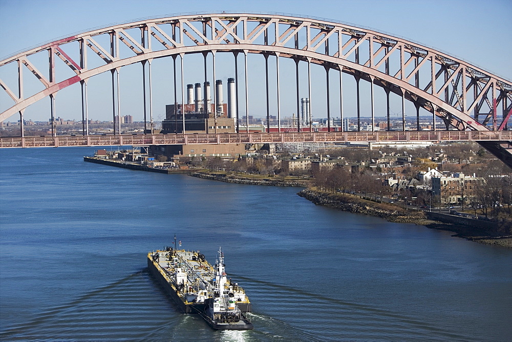 Ship under bridge