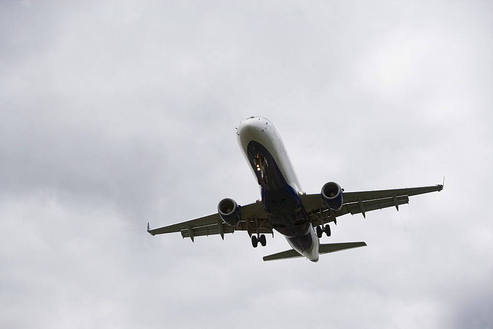 Low angle view of flying airplane