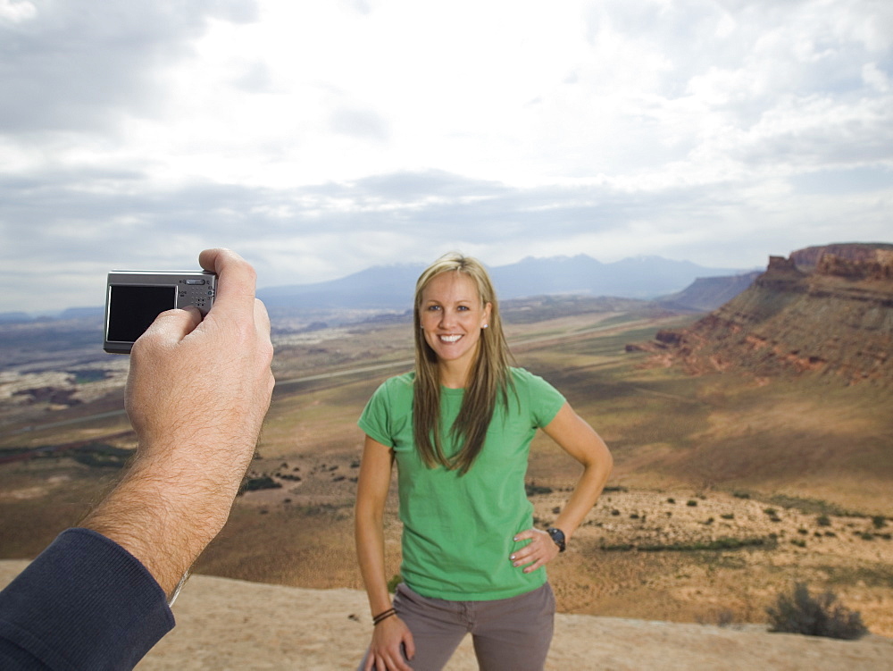 Woman having photograph taken