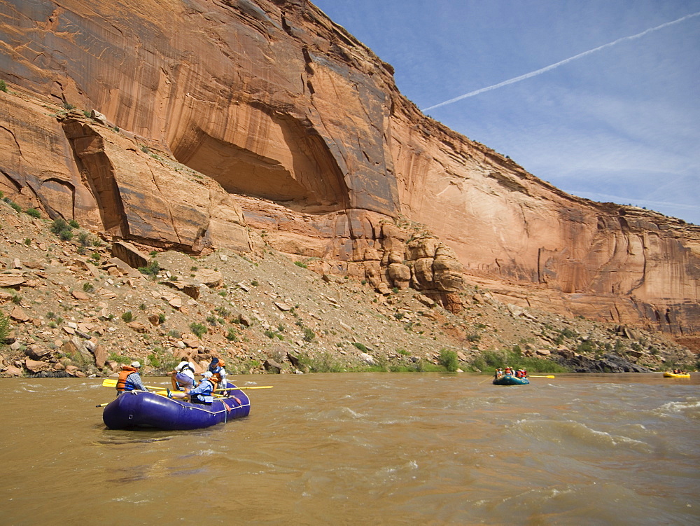 Groups of people river rafting