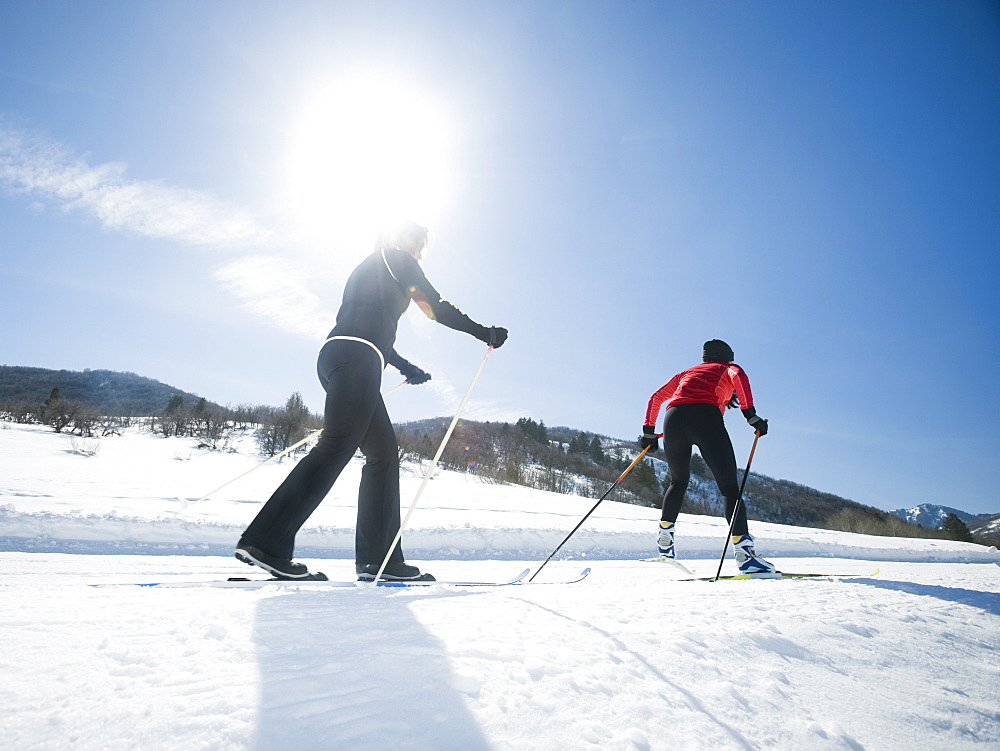 Couple cross country skiing