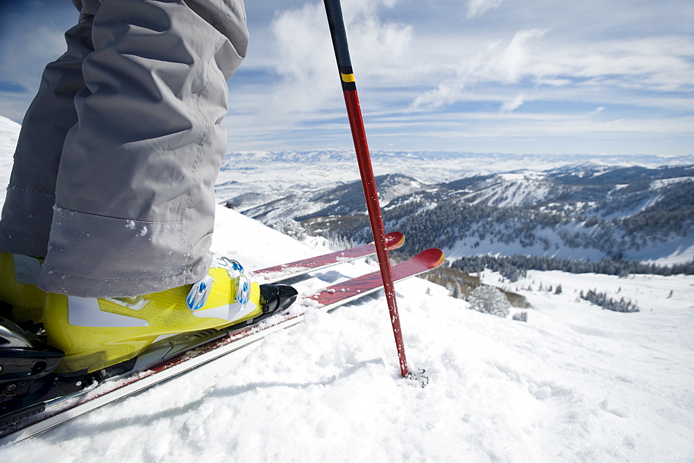 Close up of skier at top of mountain