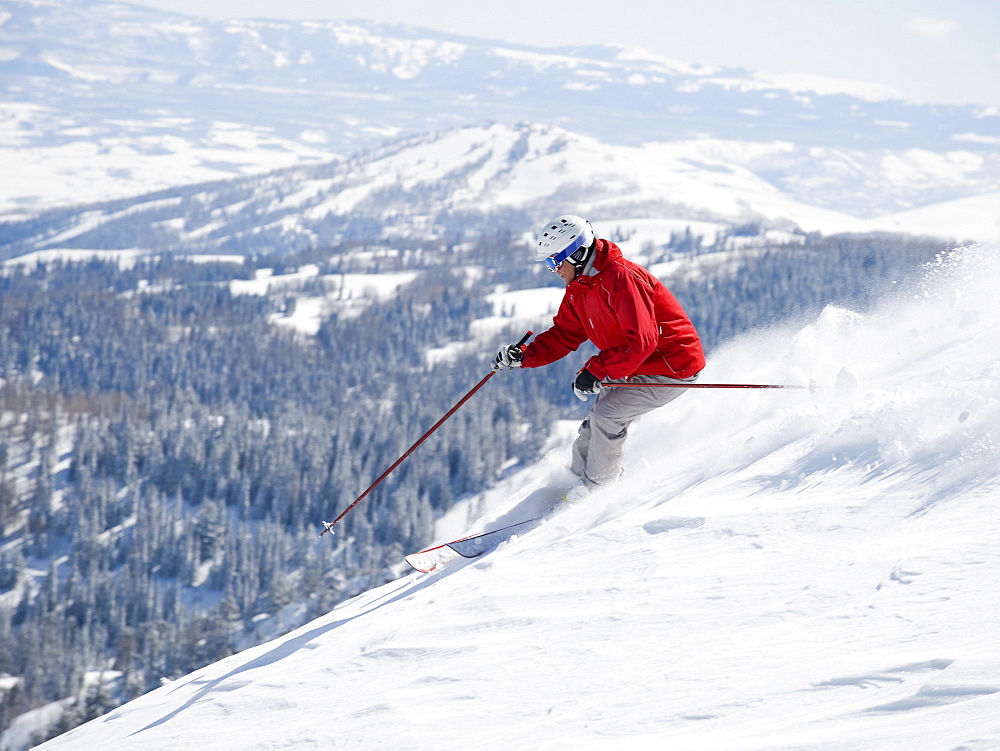 Man skiing downhill