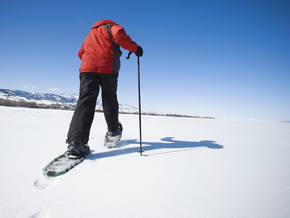 Man snow shoeing