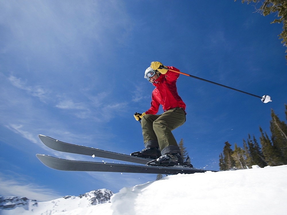 Woman on skis in air