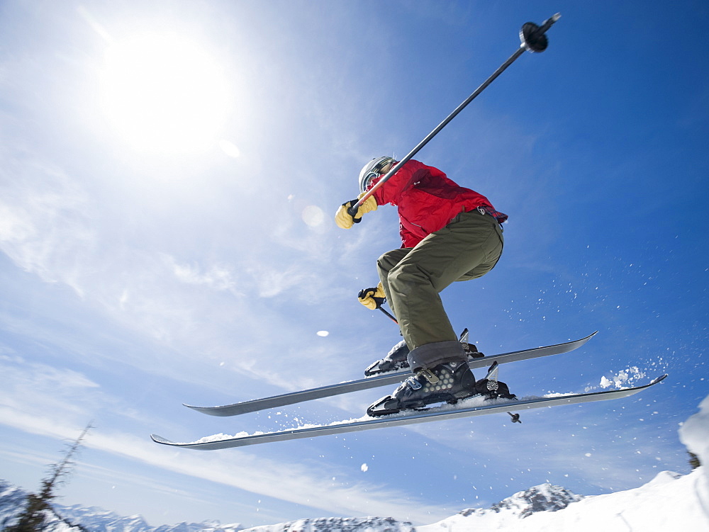 Woman on skis in air