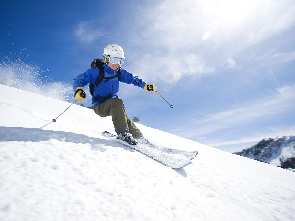 Woman skiing downhill